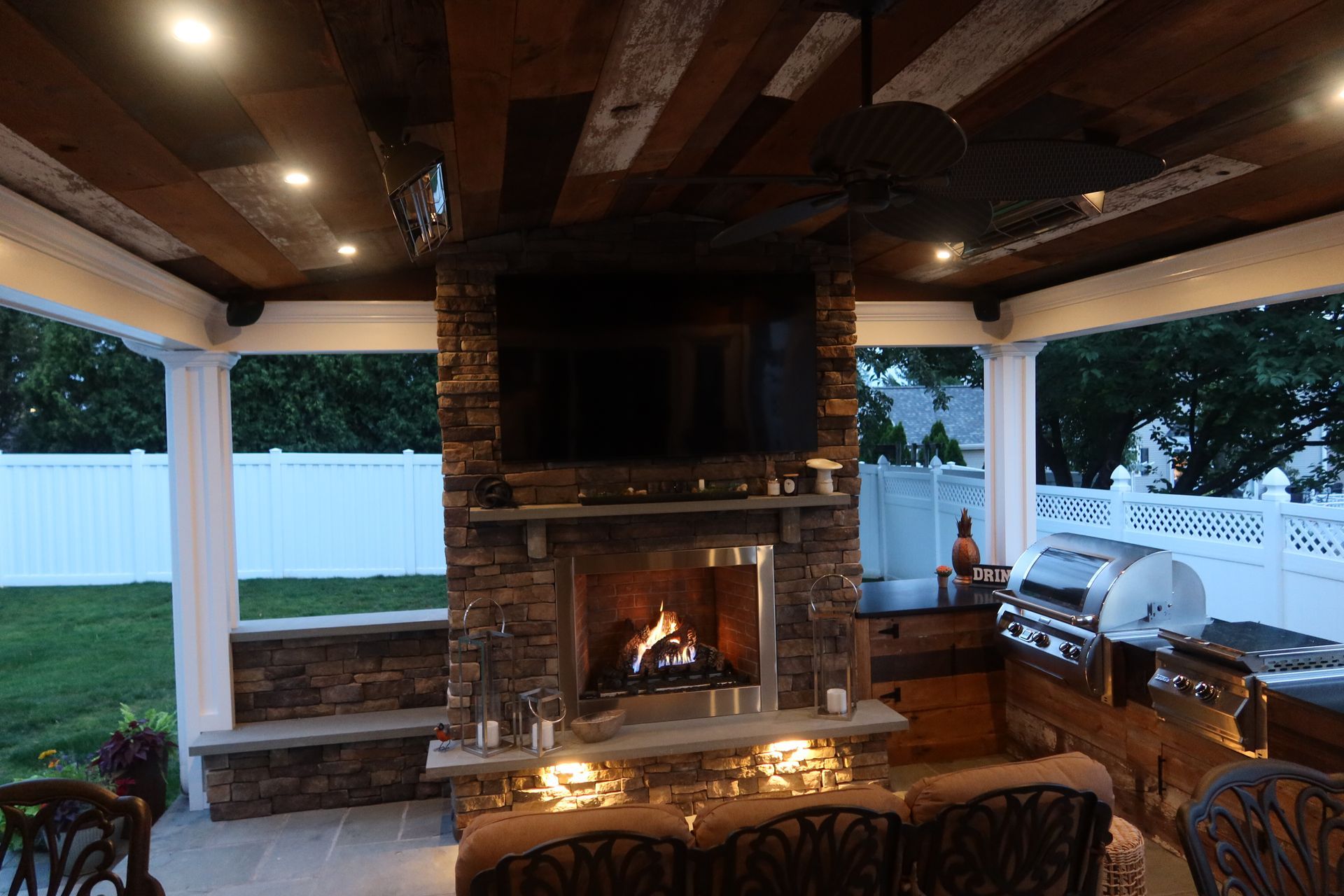 There is a fireplace in the middle of the room.