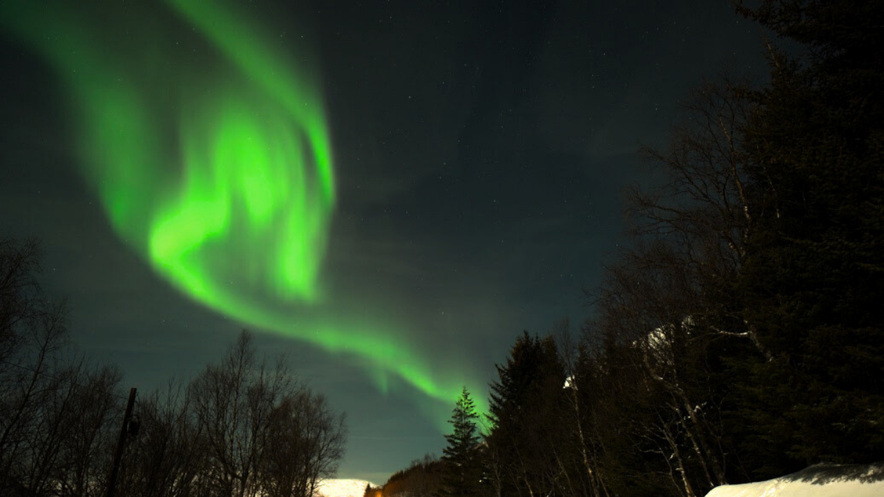 northern lights sky colored in the shape of heart
