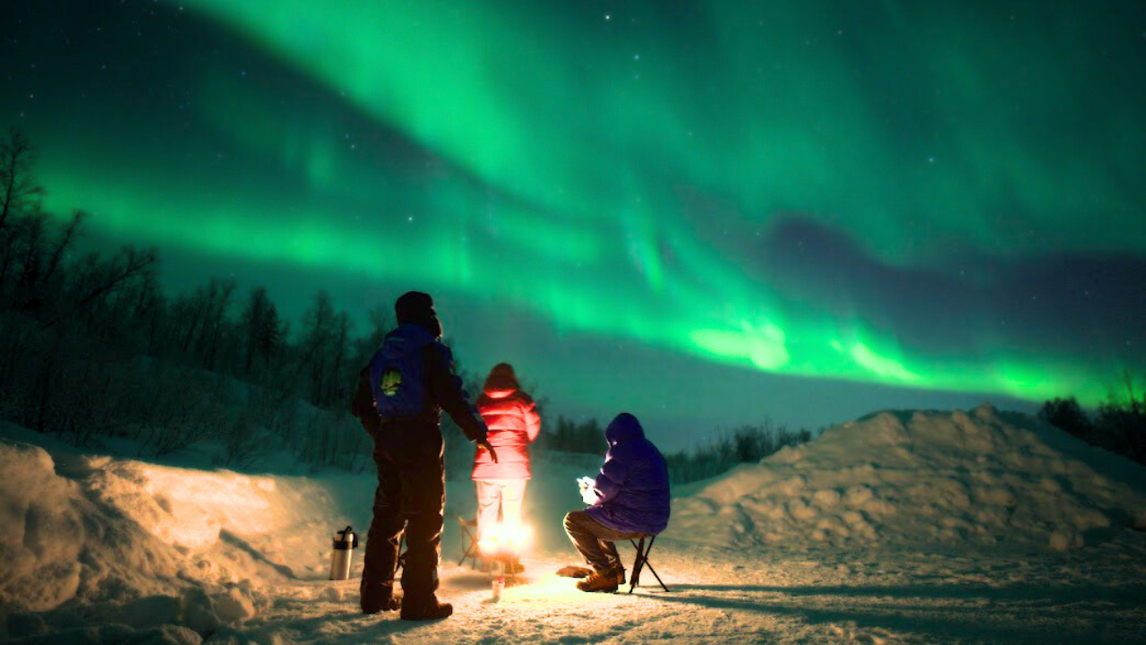Group Tromso alshemal norway northern lights tour small group campfire