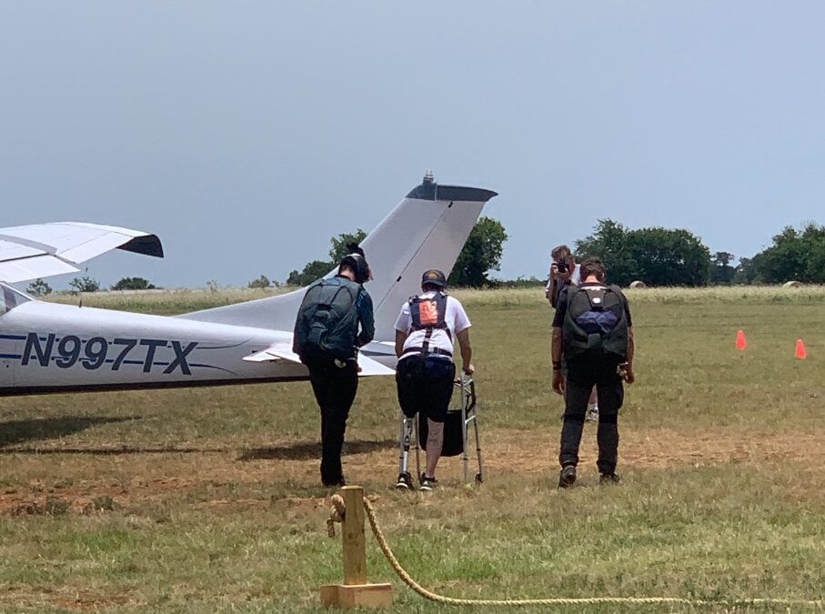 A plane with n977tx on the side of it