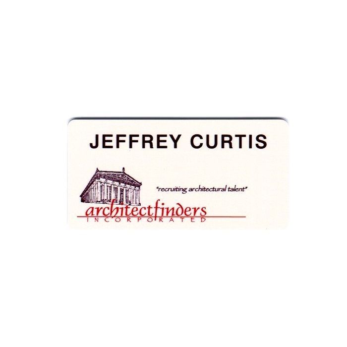 White thermal printed plastic name badge with company logo and name.