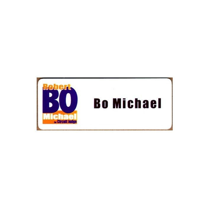 White thermal printed plastic name badge with company logo and name.