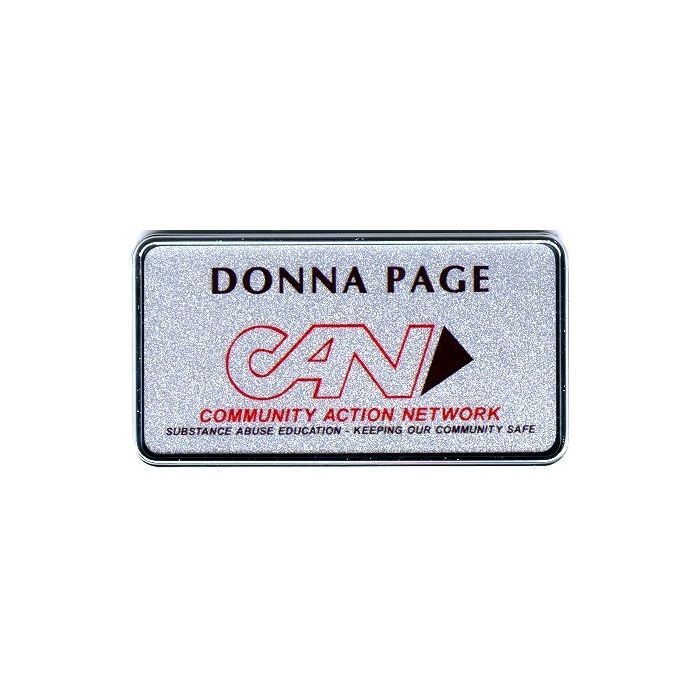Silver thermal printed plastic name badge, set in silver executive frame.