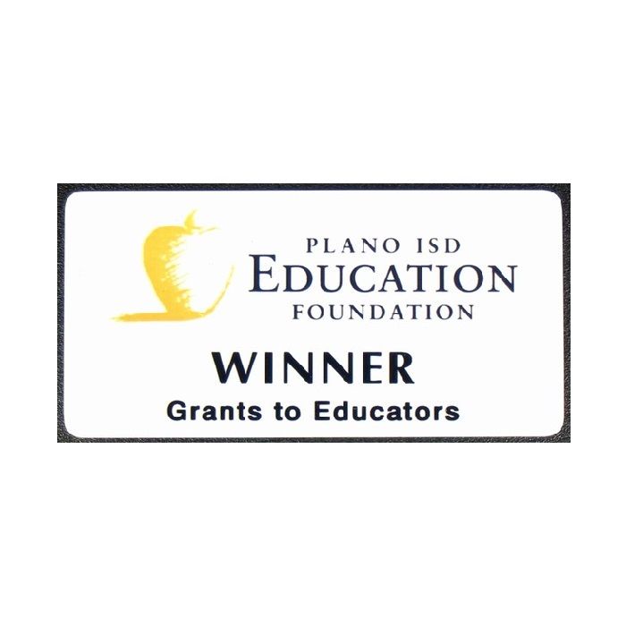 White thermal printed plastic name badge with company logo and name.