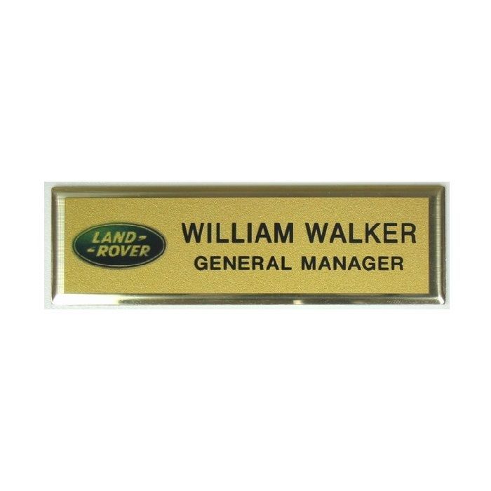 Gold thermal printed plastic name badge, set in gold premier frame.