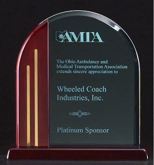 Arch shape acrylic and rosewood piano recognition award, with gold accents.