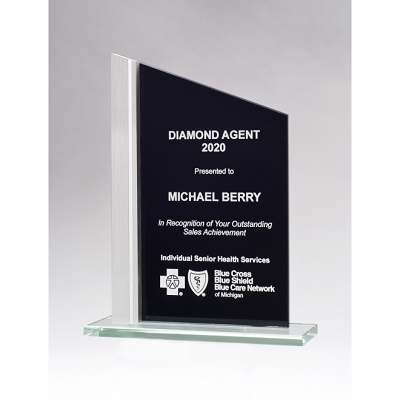 Glass recognition award with black background and silver accent.