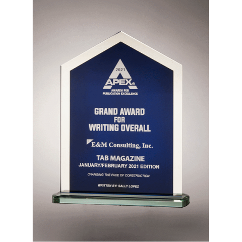 Clear glass recognition award with blue background and clear edges.