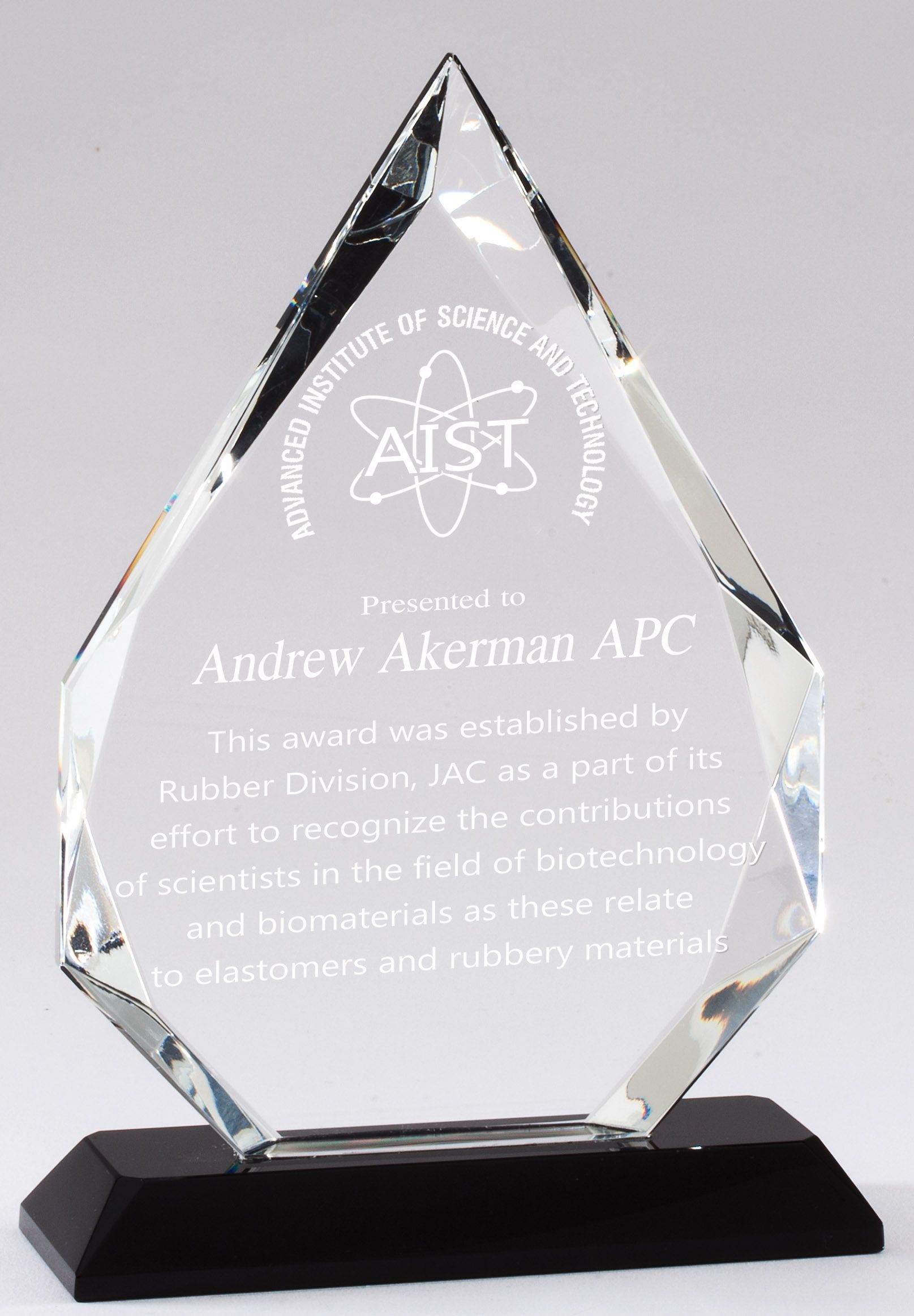 Crystal recognition award with black base.