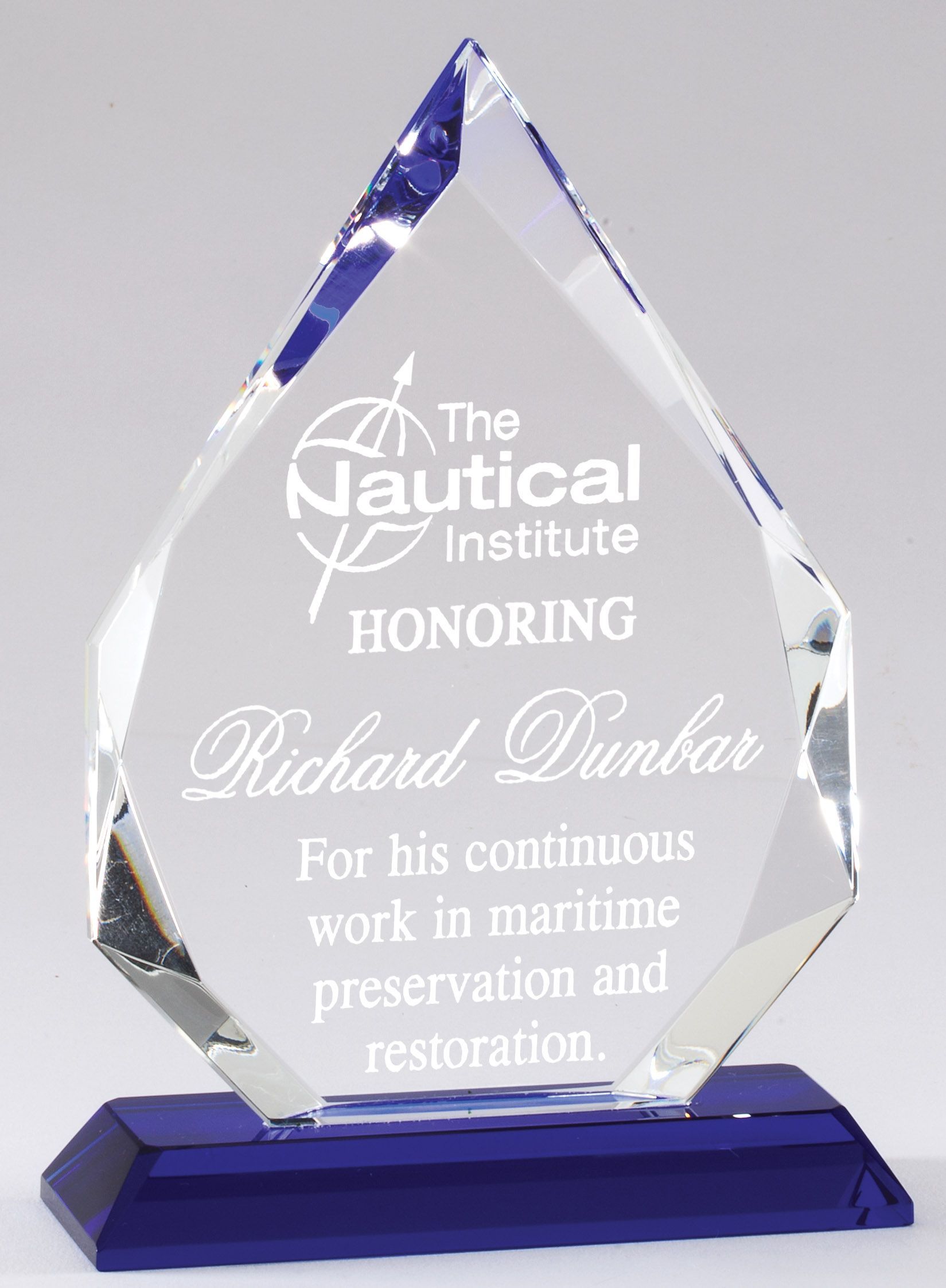 Faceted crystal arrowhead award.