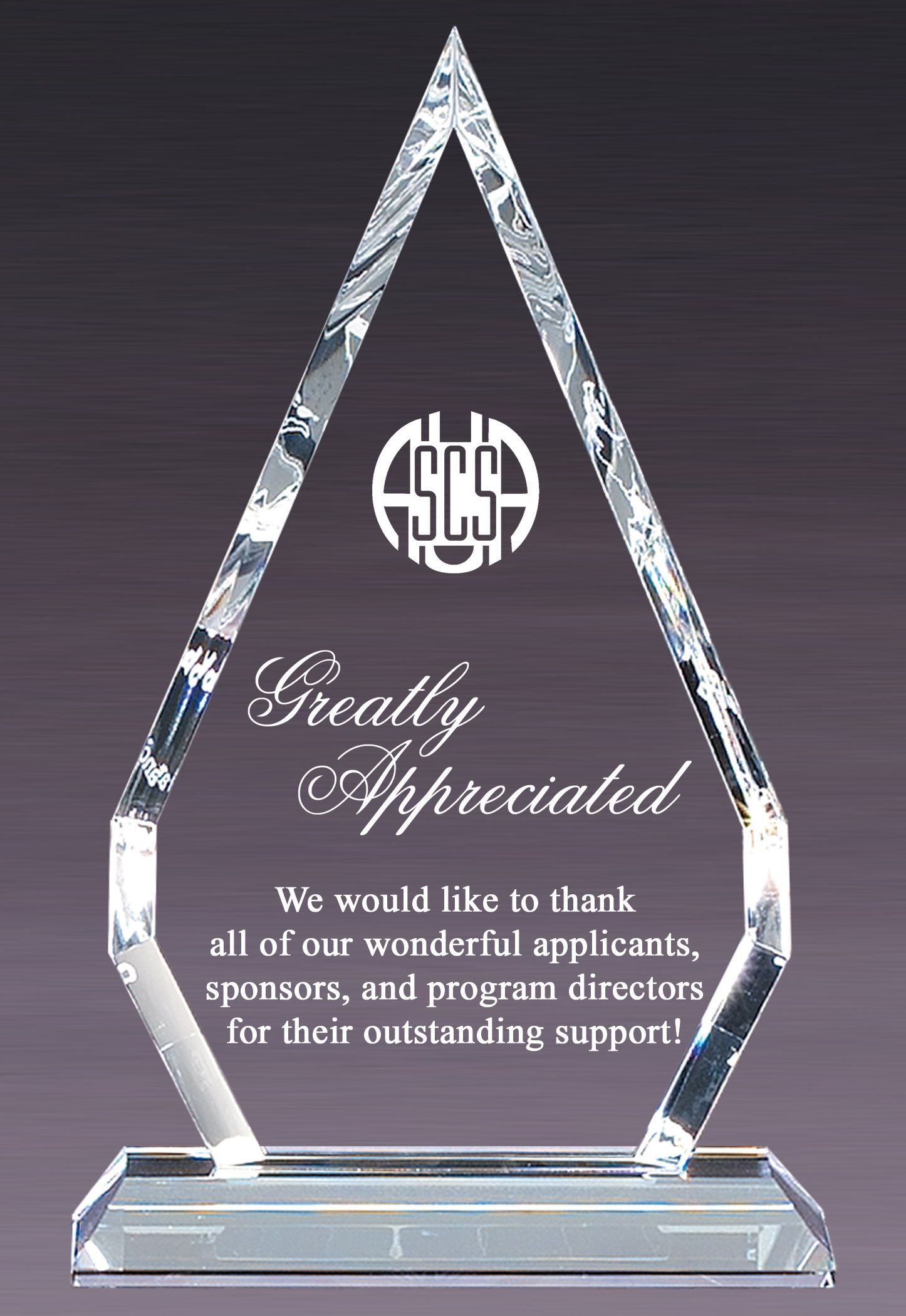 Beveled diamond shaped crystal recognition award.