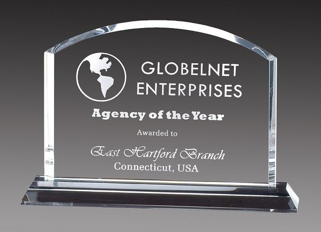 Arched billboard style crystal recognition award.