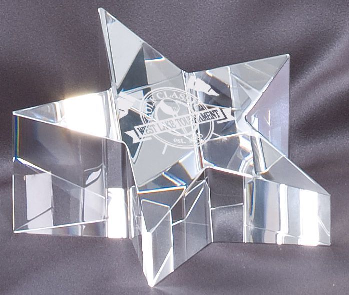 Angled crystal star paperweight recognition award.