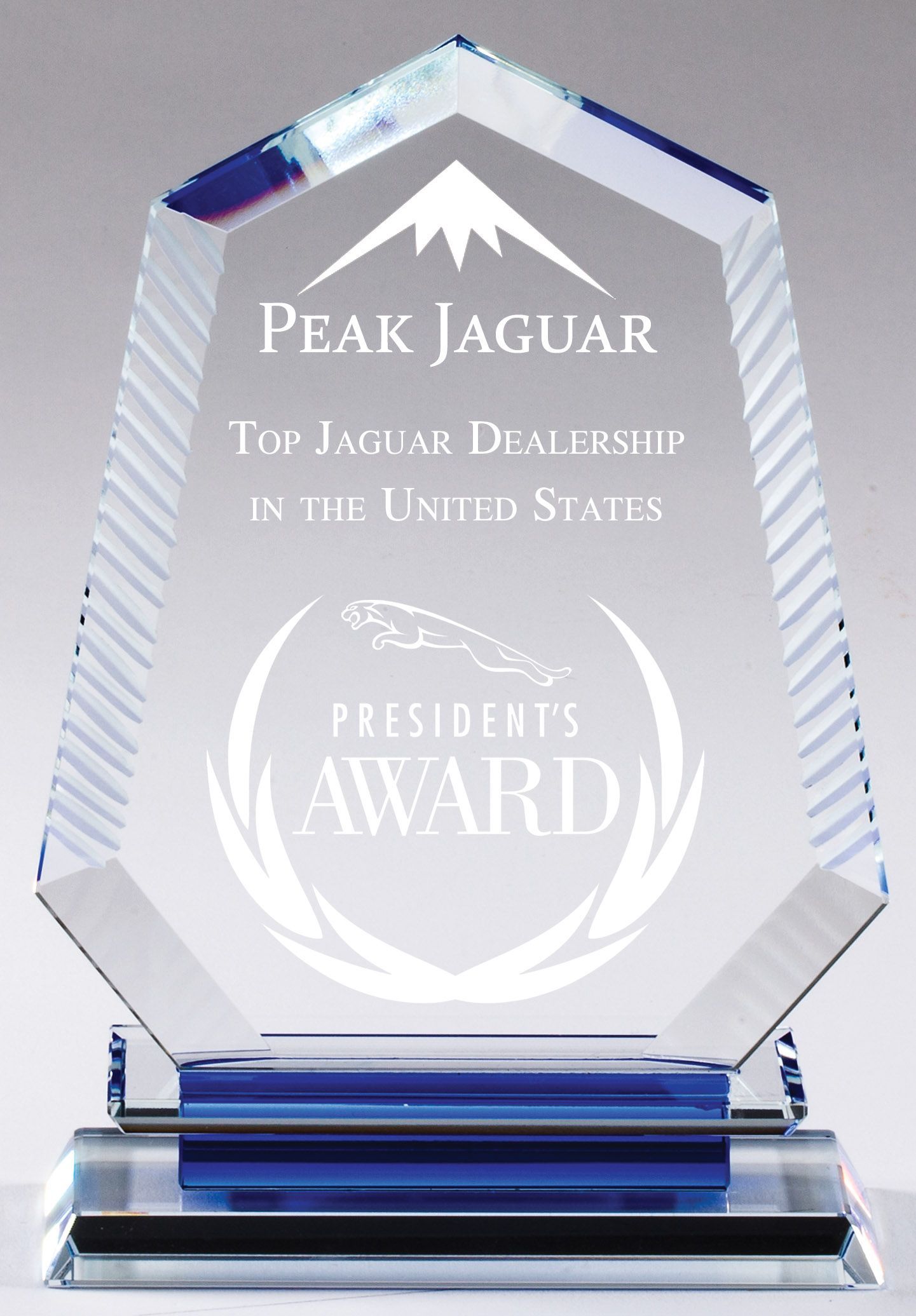Crystal recognition award with etched border.