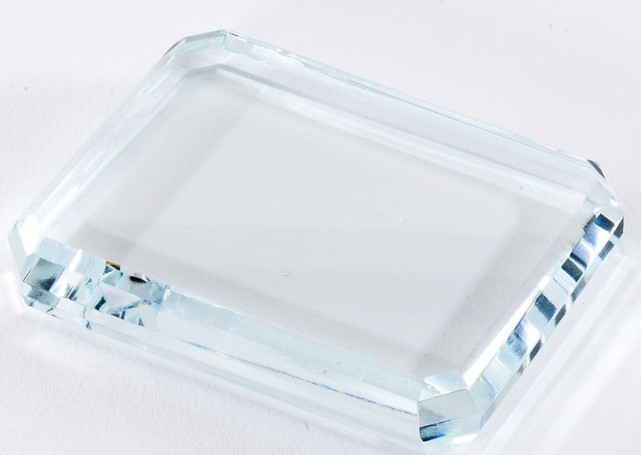 Beveled/faceted crystal paperweight.