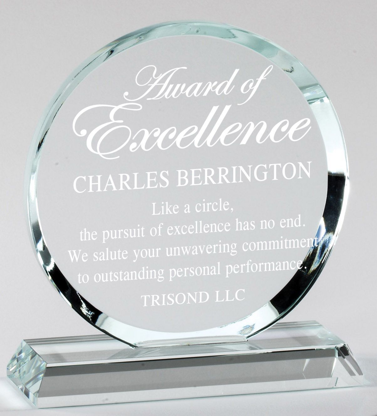 Round crystal recognition award with bevel edge.