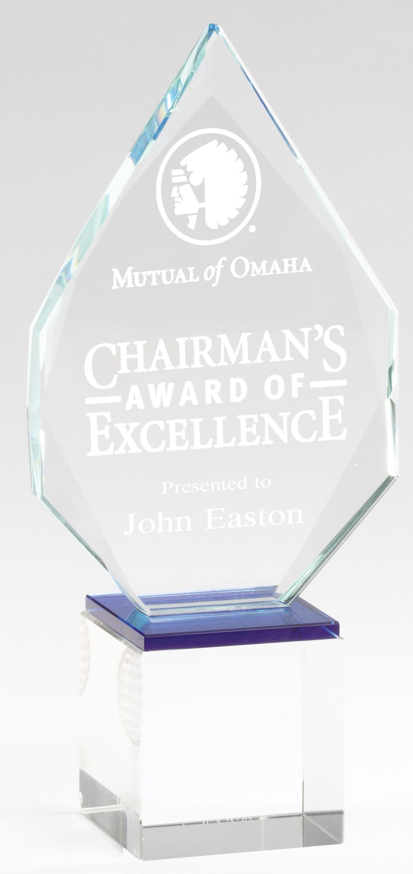 Crystal recognition award on pedestal.