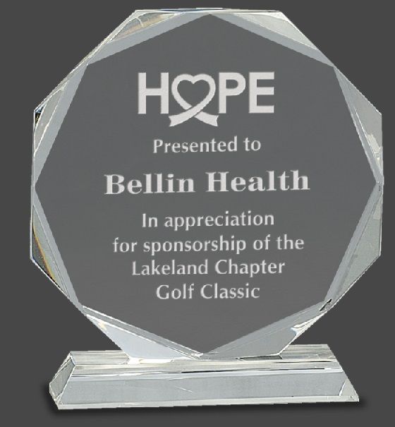 Octagon shape crystal award with beveled facets.