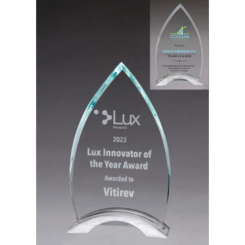 Clear glass award with silver aluminum base.