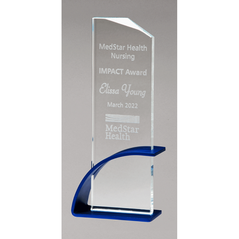 Glass award with blue base.