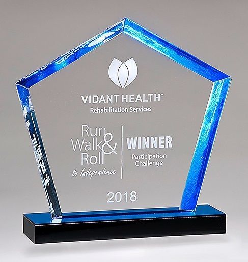Diamond shape acrylic award with blue accent.