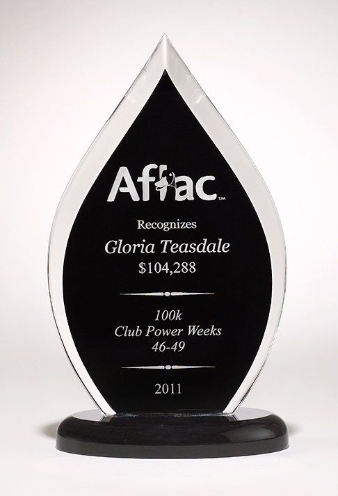 Clear and black flame shape acrylic recognition award.