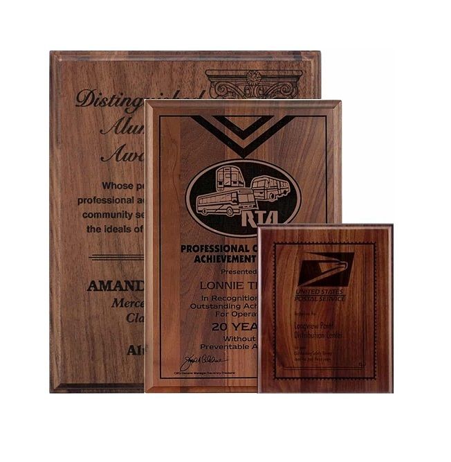 Direct laser engraved walnut plaques.