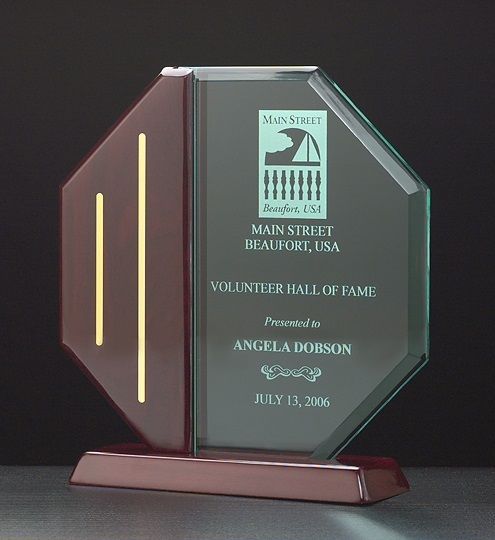 Octagon shape beveled acrylic and rosewood piano recognition award, with gold accents.