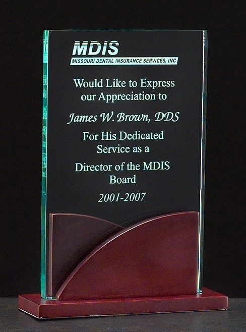 Premium jade acrylic recognition award on mahogany finished base.