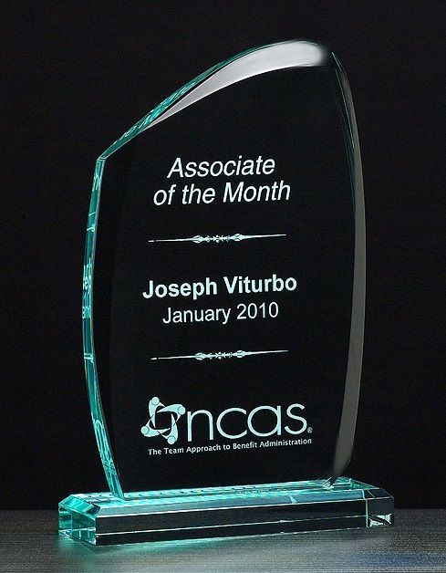 Tidal polished acrylic recognition award.
