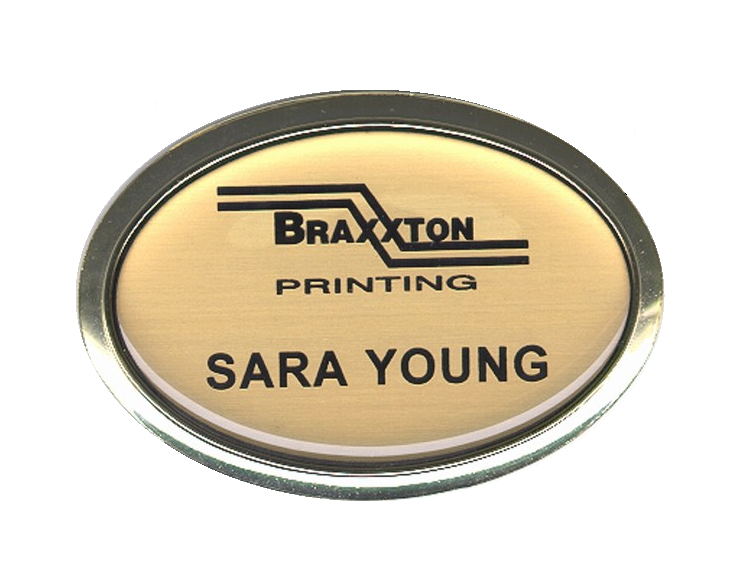 Domed laser engraved name badge in gold oval frame.