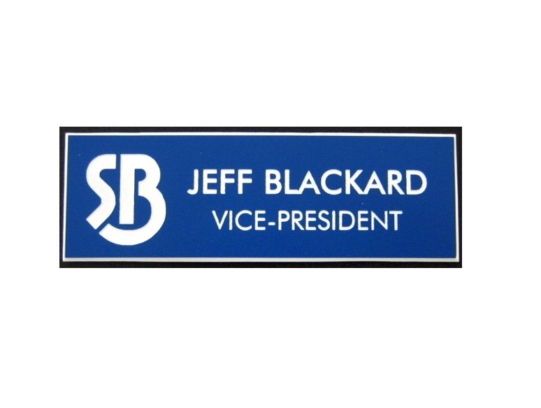 Laser engraved blue name badge featuring logo, name, and title.