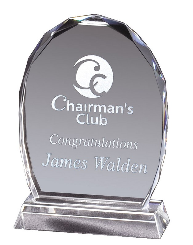 Faceted oval shaped crystal recognition award.
