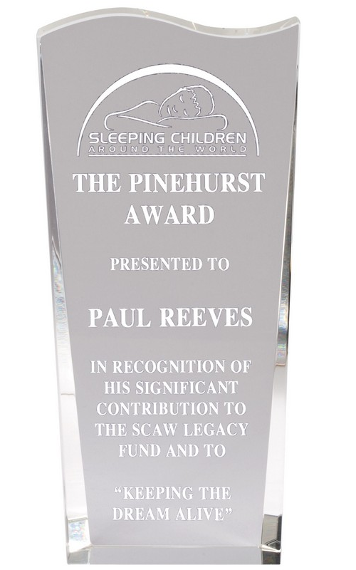 Beveled crystal recognition award.