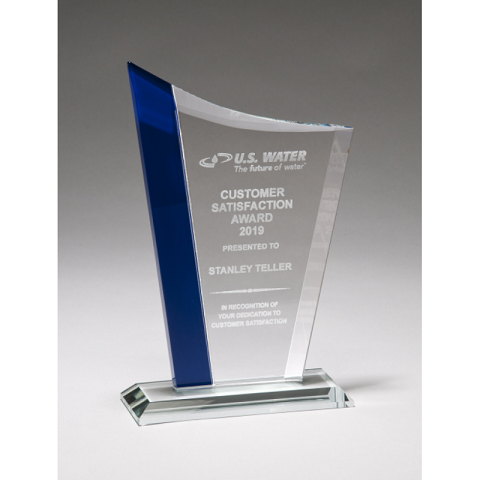 Glass recognition award with blue highlight.