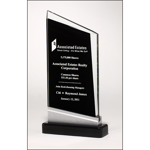 Glass recognition award with piano finish black background.
