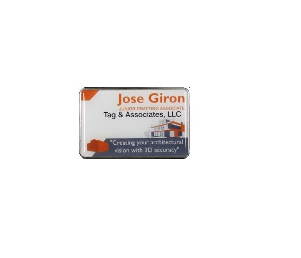 Sublimated white aluminum name badge with protective dome in large silver frame.