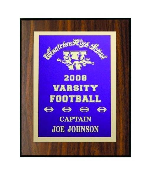 Walnut wooden recognition award plaque with gold edges/lettering, with violet background.
