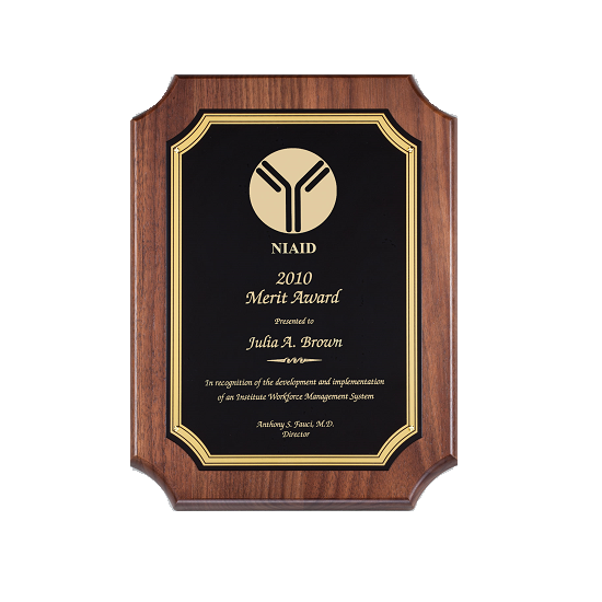 Scalloped corner wooden recognition plaque with ornate gold accents.