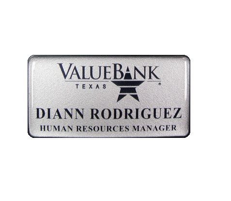 Thermal printed plastic name badge with protective dome.