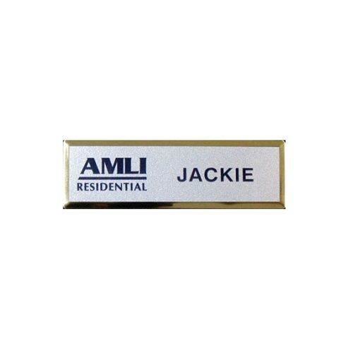 Thermal printed silver name badge on small premier gold frame.