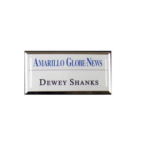 Sublimated brushed aluminum name badge with protective dome on large silver premier frame.