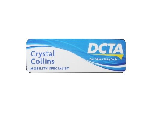 Sublimated white aluminum name badge.