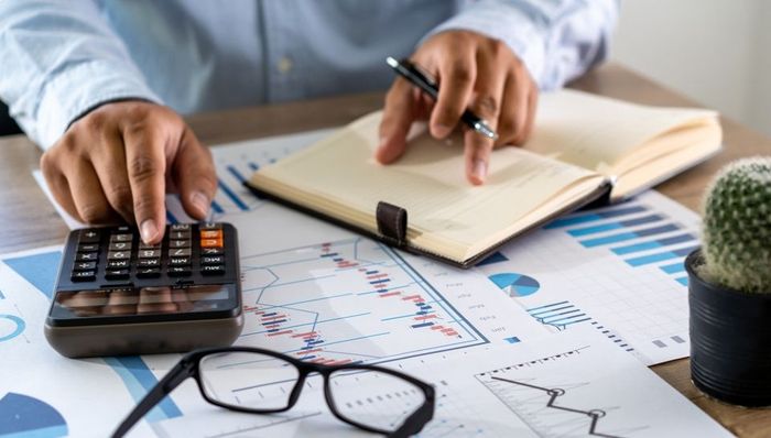 administrator business man financial inspector and secretary making report calculating balance