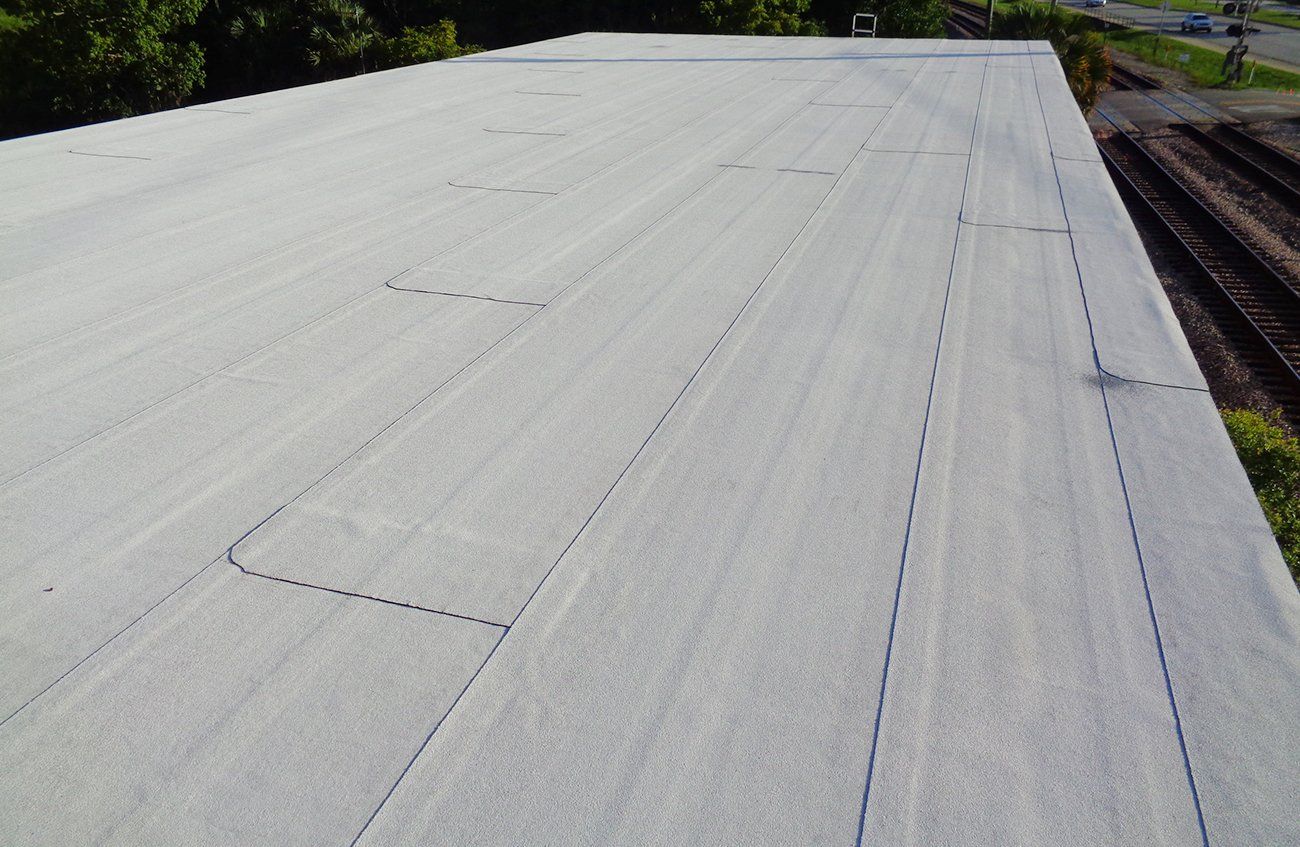 A large gray roof with a lot of lines on it