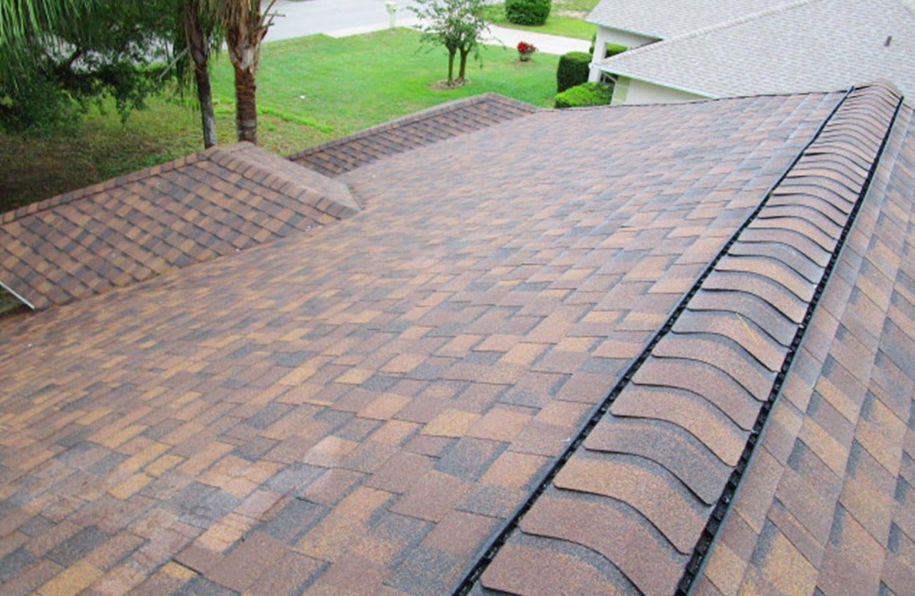 A close up of a roof with a ladder on it.