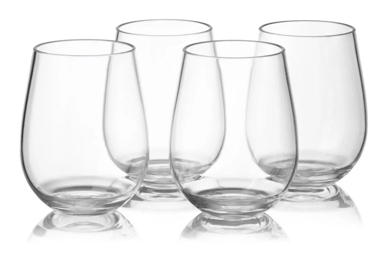 Four clear stemless wine glasses.