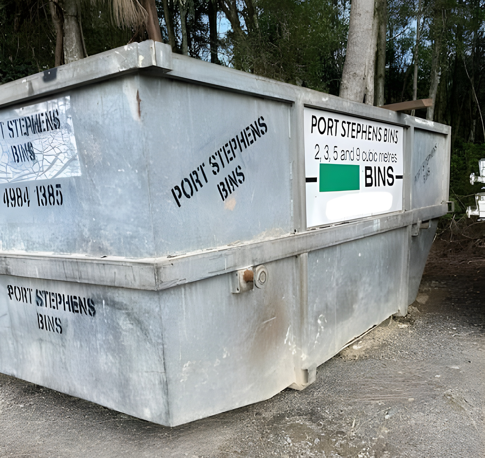 An Overfilled Green Skip Bin An Overfilled Green Skip Bin