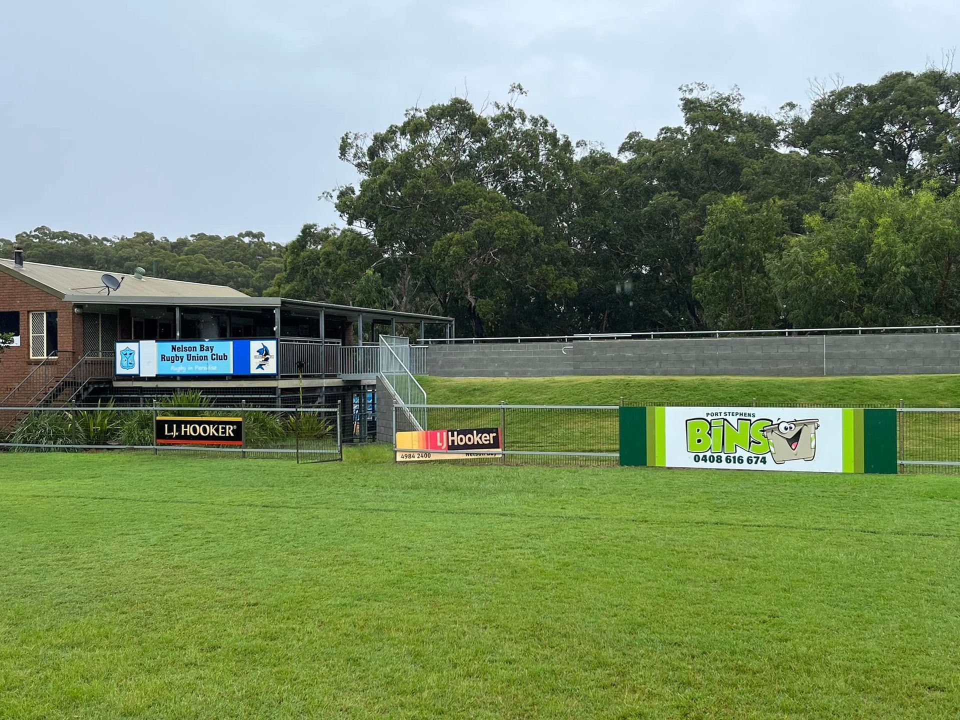 Port Stephens Bins Logo on the Football Field - Skip Hire in Port Stephens
