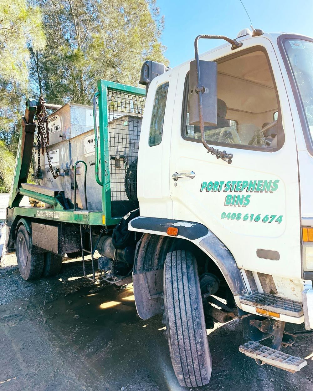 Skip Bins Loaded On A Truck